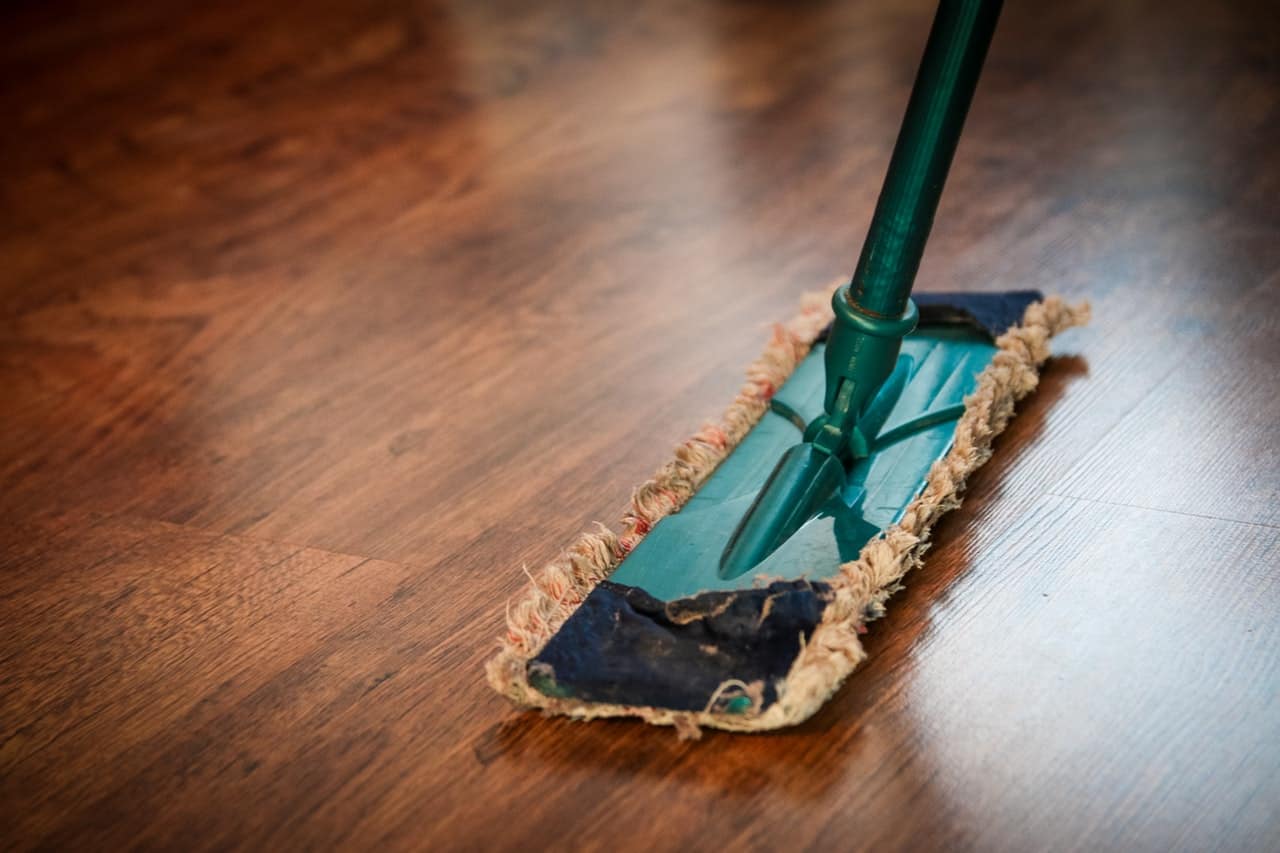a mop on the wooden floor